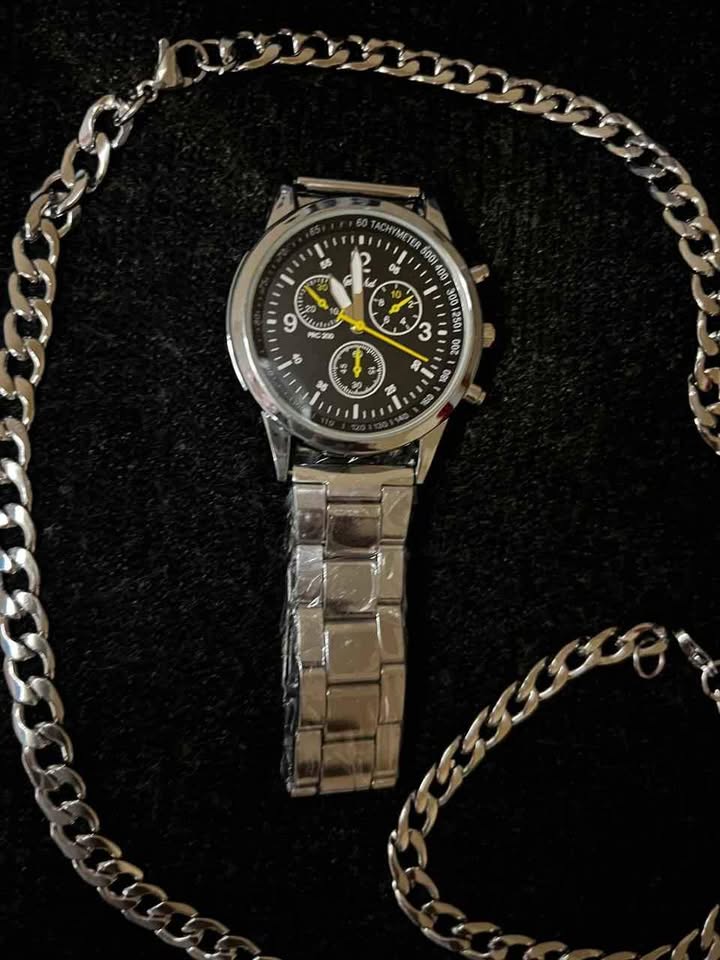 Conjunto de joyería de acero inoxidable incluye reloj carátula negra, cadena de 5 mm por 60 cm de largo, esclava de 20 cm de ancho