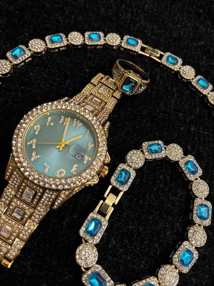 Conjunto de joyería color dorado con pedrería en color verde azul, joyas llamativas ideal para lucirte en tus eventos