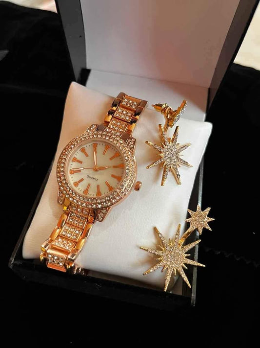 Conjunto de joyería incluye reloj de acero color oro rosa con incrustación de pedrería y aretes color oro rosa con incrustación de pedrería