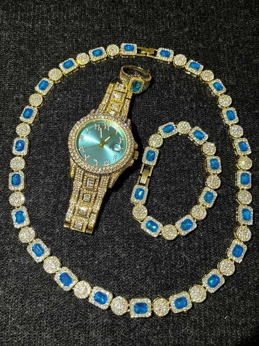 Conjunto de joyería color dorado con pedrería en color verde azul, joyas llamativas ideal para lucirte en tus eventos