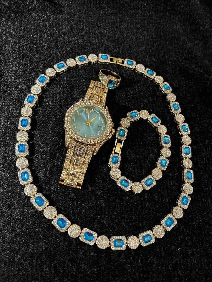 Conjunto de joyería color dorado con pedrería en color verde azul, joyas llamativas ideal para lucirte en tus eventos
