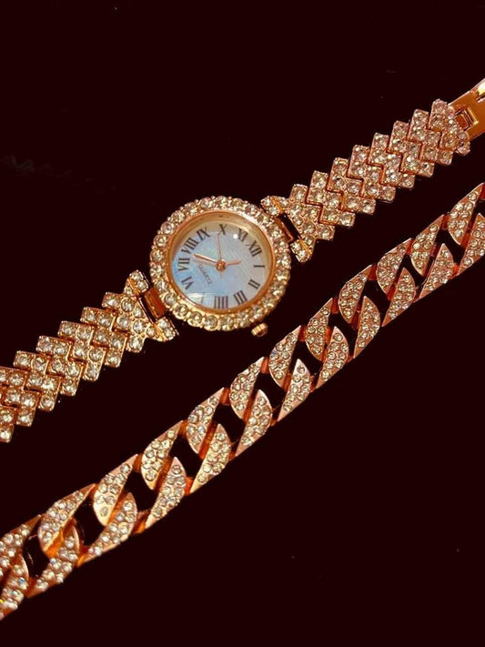 Conjunto de reloj color oro rosa con incrustación de pedrería y esclava color rosa con incrustación de pedrería